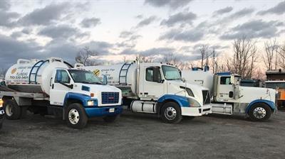 24/7 Pumping trucks lined up Photo
